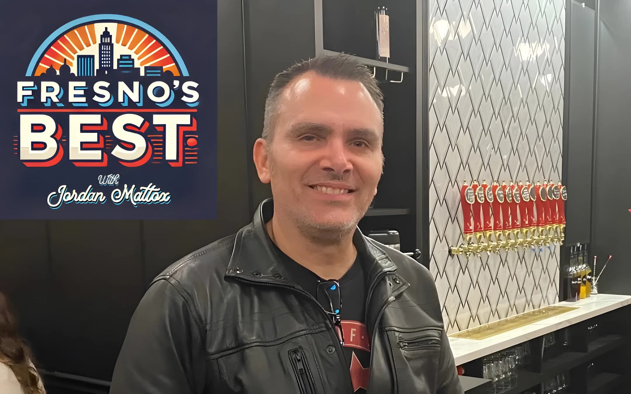 Dana in the pub, having a beer.