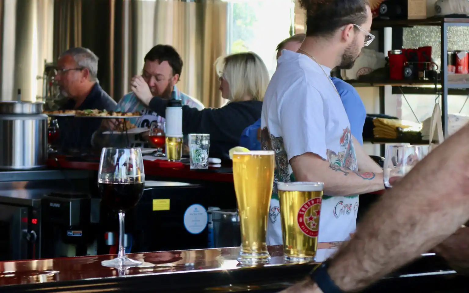 diners enjoying food and drink at south of shaw